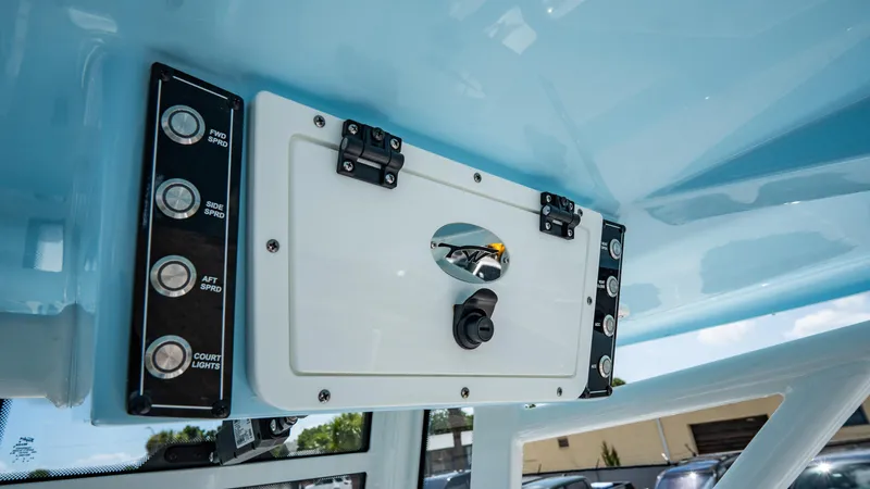 Slide: The Image of Control panel of the 2025 Tidewater 232 CC Adventure boat. - 13