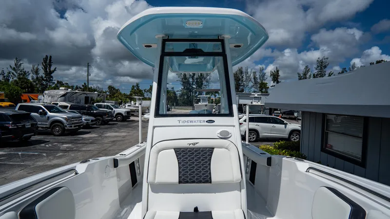 Slide: The Image of 2025 Tidewater 232 CC Adventure boat with center console and seating. - 15