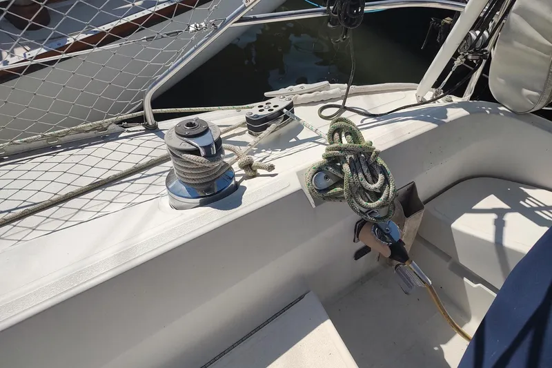 Slide: The Image of Deck of 1987 Hunter 37 Legend sailboat with winch and ropes. - 6