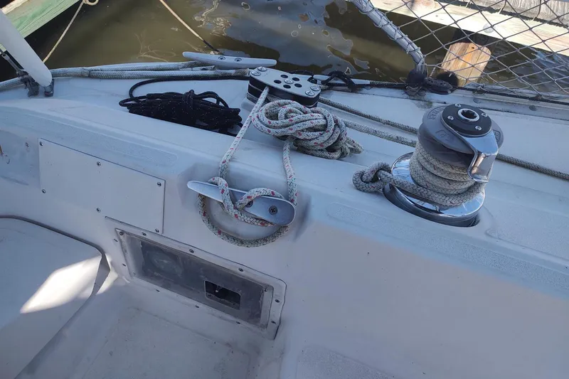 Slide: The Image of Deck of 1987 Hunter 37 Legend sailboat with ropes and winch. - 10