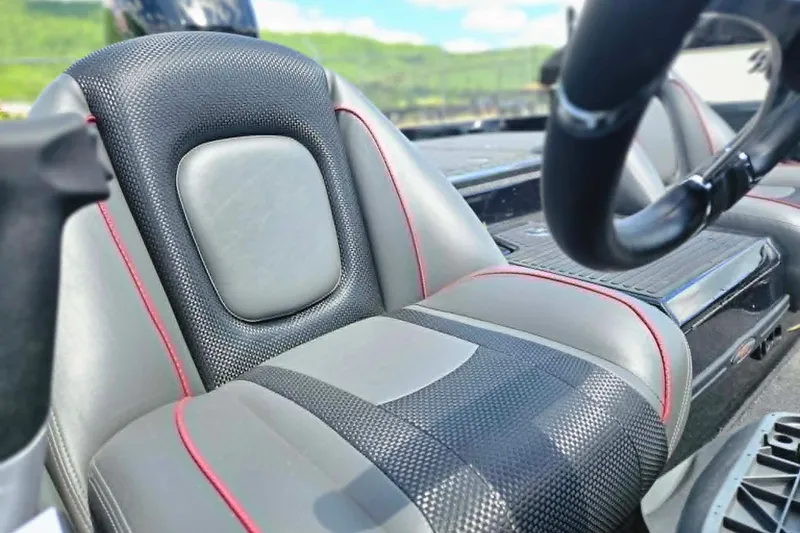 Slide: The Image of 2025 Ranger Z518 Cup-Equipped boat seat with sleek design and red accents. - 15