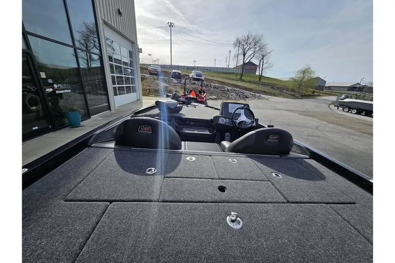 Slide: The Image of 2025 Ranger Z518 Cup-Equipped boat, rear view, parked outside dealership. - 3