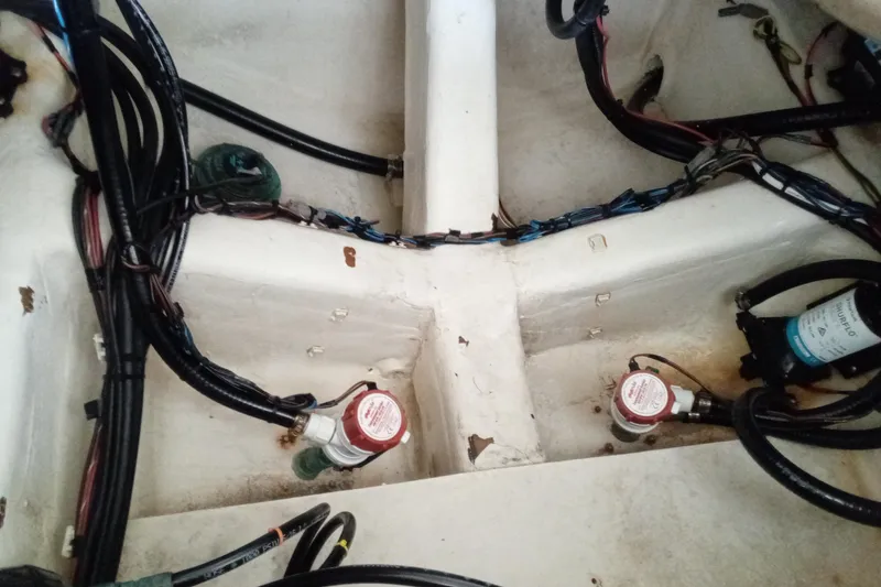 Slide: The Image of 2014 Cobia 296 Center Console wiring and bilge pump system. - 41