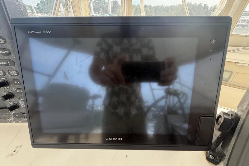 Slide: The Image of Garmin GPSMAP XSV on 1986 Ocean Yachts 38 Super Sport dashboard. - 13