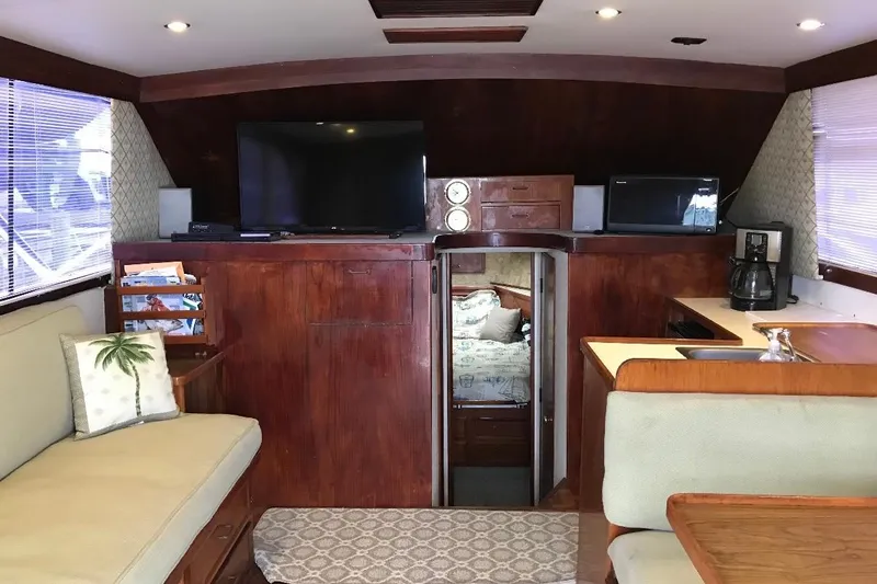 Slide: The Image of Interior of 1986 Ocean Yachts 38 Super Sport with cozy seating and modern amenities. - 28