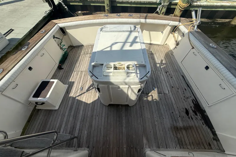 Slide: The Image of 1986 Ocean Yachts 38 Super Sport boat deck with storage and seating. - 7