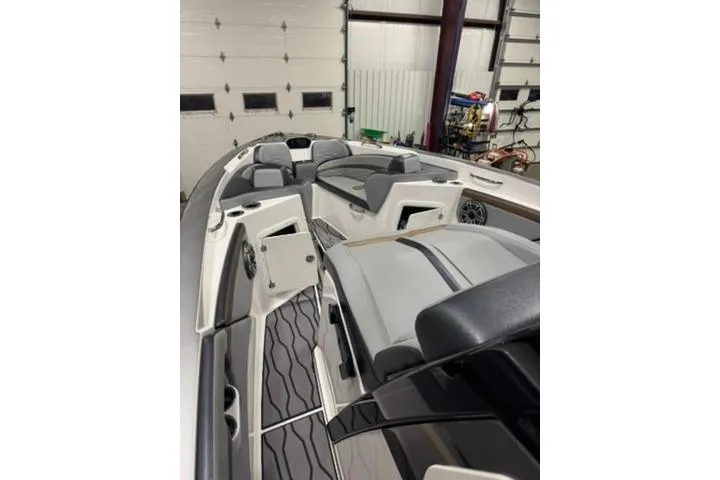 Slide: The Image of 2023 Sunsation 32 CCX boat interior with sleek seating and modern design. - 12