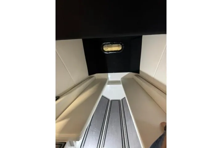 Slide: The Image of Interior view of 2023 Sunsation 32 CCX boat cabin with sleek design. - 14