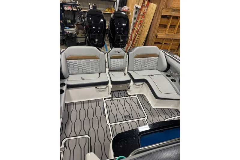Slide: The Image of 2023 Sunsation 32 CCX boat interior with stylish seating and modern design. - 8