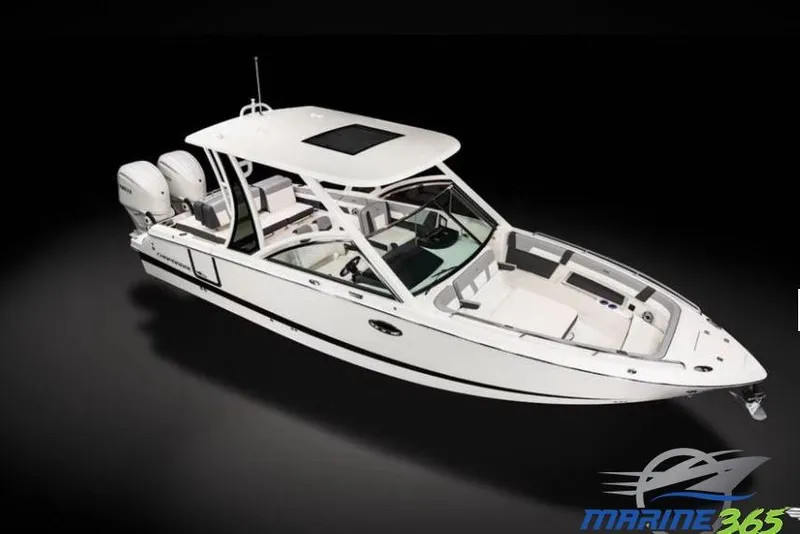 Slide: The Image of 2026 Chaparral 310 OSX boat with dual engines, sleek design, and spacious seating. - 0