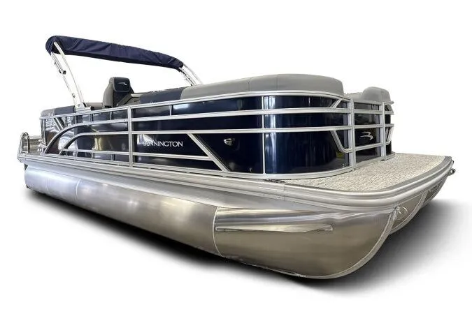 The Image of 2026 Bennington 22 SSRSE pontoon boat with sleek design and blue canopy. - 2