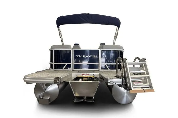 Slide: The Image of 2026 Bennington 22 SSRSE pontoon boat with canopy and rear ladder. - 7