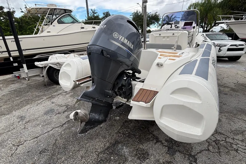 Slide: The Image of 2019 Brig Eagle 650 boat with Yamaha outboard motor, parked on a lot. - 14