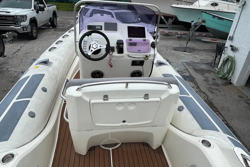 Slide: The Image of 2019 Brig Eagle 650 boat interior with steering wheel and dashboard controls. - 9