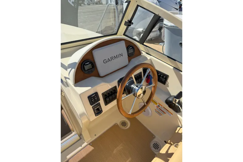 Slide: The Image of Helm of 2026 Rossiter 23 Classic boat with Garmin navigation system. - 10