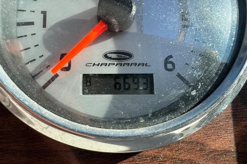 Slide: The Image of Close-up of a Chaparral 276 SSX 2007 boat tachometer showing 669.3 hours. - 16