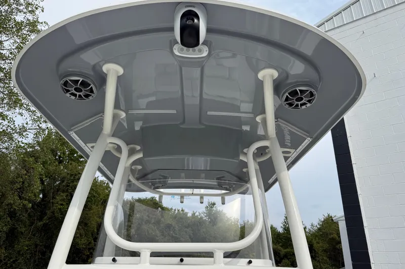 Slide: The Image of 2024 Parker 2300 Special Edition boat with T-top and speakers, viewed from below. - 16