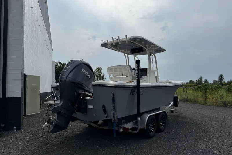Slide: The Image of 2024 Parker 2300 Special Edition boat with Yamaha engine on trailer. - 6