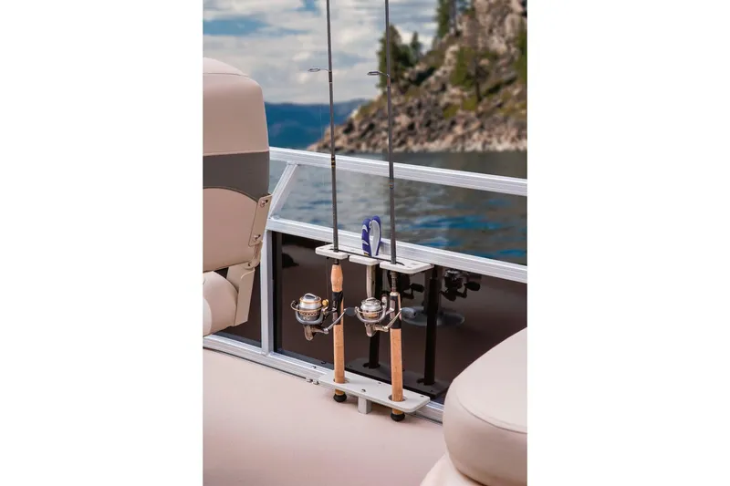 Slide: The Image of 2014 Sun Tracker Bass Buggy 18 DLX pontoon boat with red canopy and outboard motor. - 4