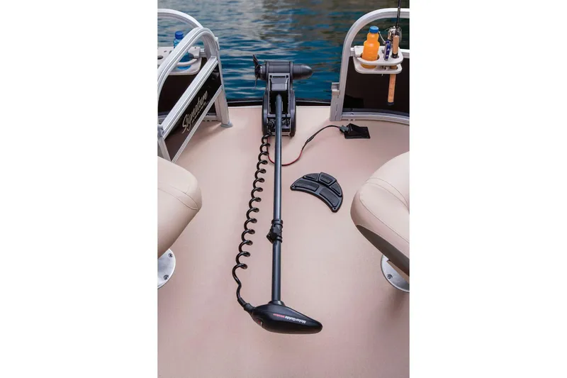 Slide: The Image of Interior of 2014 Sun Tracker Bass Buggy 18 DLX with beige seating and cup holders. - 6