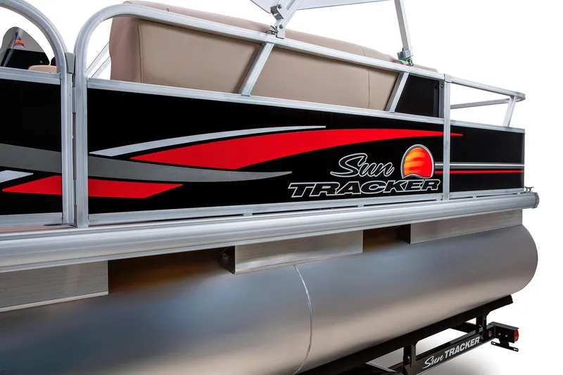 Slide: The Image of 2014 Sun Tracker Bass Buggy 18 DLX pontoon boat interior with seating and a spare tire. - 8