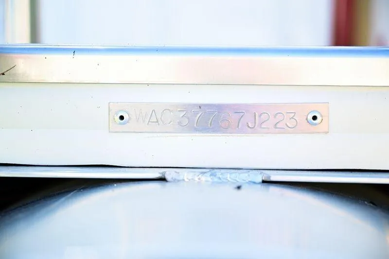 Slide: The Image of 2023 Aloha Pontoon Mahalo 23 serial number plate close-up. - 12