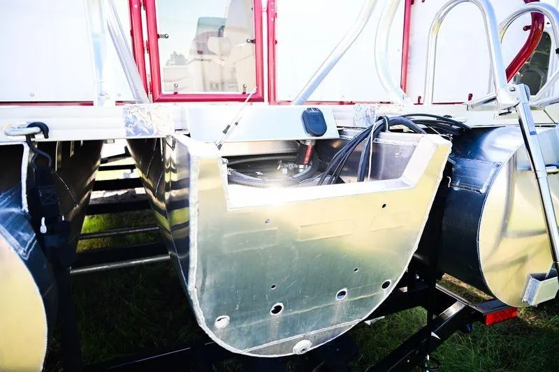 Slide: The Image of 2023 Aloha Pontoon Mahalo 23 boat with visible pontoon structure and components. - 5