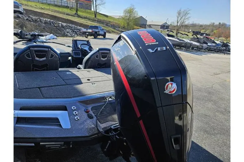 Slide: The Image of 2025 Ranger Z519 Garmin Ranger Cup boat with powerful V8 engine in outdoor setting. - 3