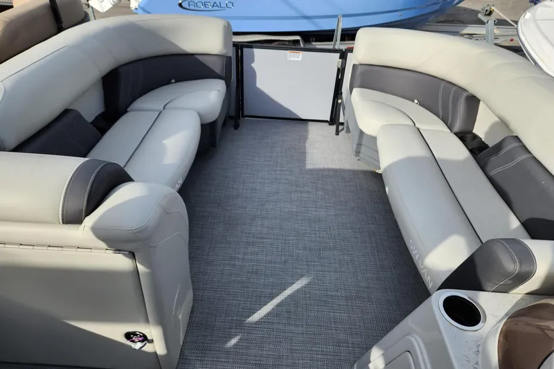 Slide: The Image of 2023 Sylvan X5 boat interior with plush seating and modern design. - 15