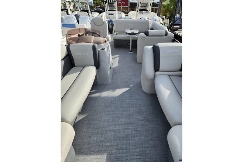 Slide: The Image of 2023 Sylvan X5 boat interior with luxurious seating and modern design. - 16