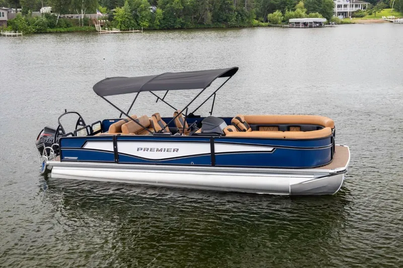 Slide: The Image of 2026 Premier 270 Intrigue RF pontoon boat on a serene lake. - 3