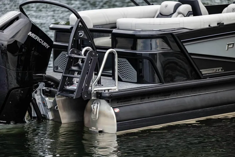 Slide: The Image of 2026 Premier 270 Intrigue RF pontoon boat with Mercury engine, docked on water. - 4