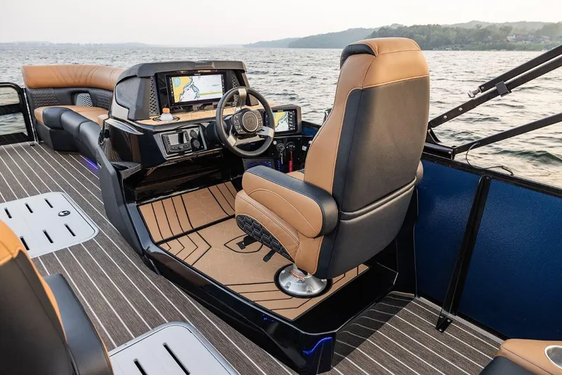 Slide: The Image of 2026 Premier 270 Intrigue RF boat interior with luxurious seating and advanced navigation system. - 5