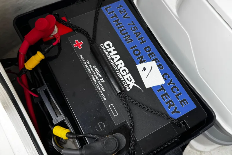 Slide: The Image of 12V 75Ah lithium-ion deep cycle battery in Parker 2100 Center Console boat. - 15