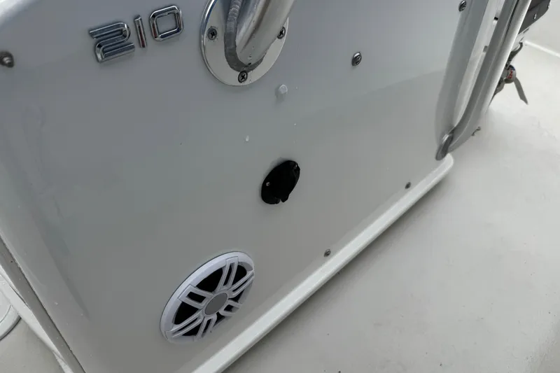 Slide: The Image of Parker 2100 Center Console 2021 boat detail with speaker and handle. - 20