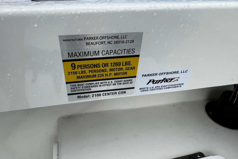 Slide: The Image of Capacity label on 2021 Parker 2100 Center Console boat, maximum 9 persons or 1269 lbs. - 21