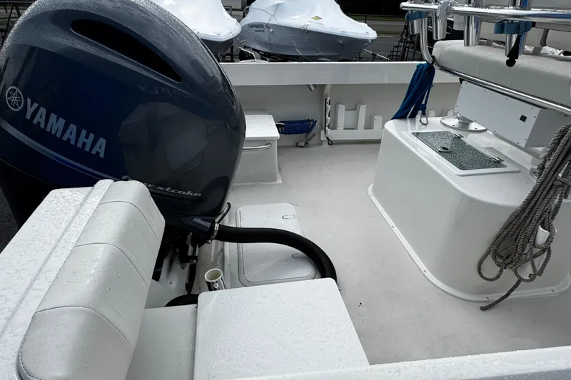 Slide: The Image of 2021 Parker 2100 Center Console boat with Yamaha outboard engine, wet deck view. - 38