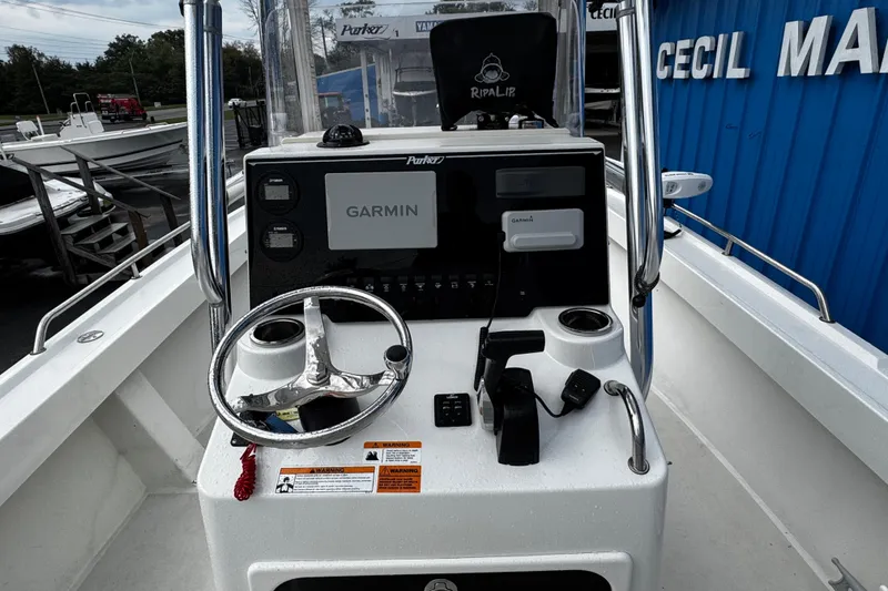 Slide: The Image of 2021 Parker 2100 Center Console boat dashboard with Garmin navigation system. - 40
