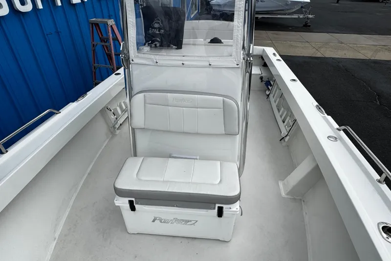 Slide: The Image of 2021 Parker 2100 Center Console boat interior with seating and storage. - 44