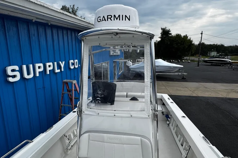Slide: The Image of 2021 Parker 2100 Center Console boat with Garmin equipment at a supply company. - 45