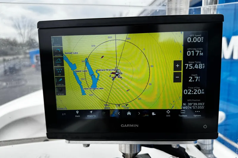 Slide: The Image of Garmin GPS display on 2021 Parker 2100 Center Console boat, showing lake navigation map. - 6
