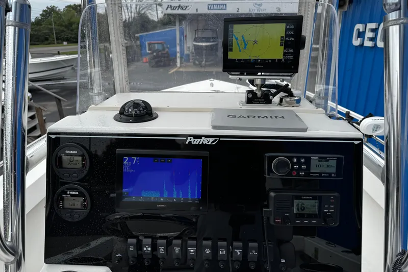 Slide: The Image of Control panel of a 2021 Parker 2100 Center Console boat with Garmin navigation system. - 7