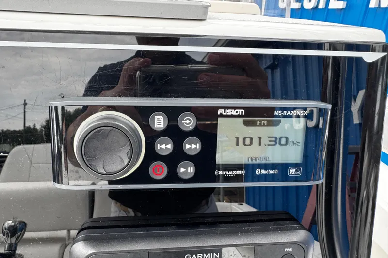 Slide: The Image of Fusion MS-RA70NSX radio on 2021 Parker 2100 Center Console, displaying FM 101.30 MHz. - 9