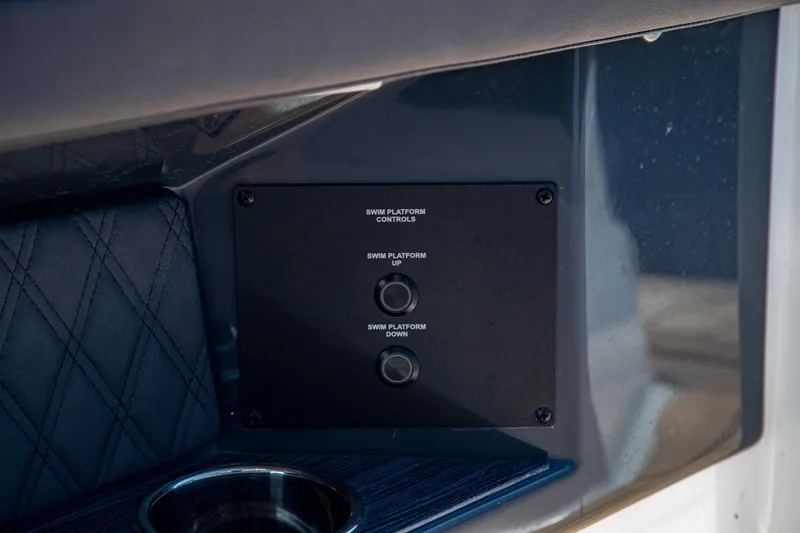 Slide: The Image of Control panel for swim platform on 2023 Cobalt R33 boat. - 25