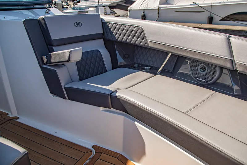 Slide: The Image of Luxurious seating on 2023 Cobalt R33 boat with elegant upholstery and speaker system. - 36