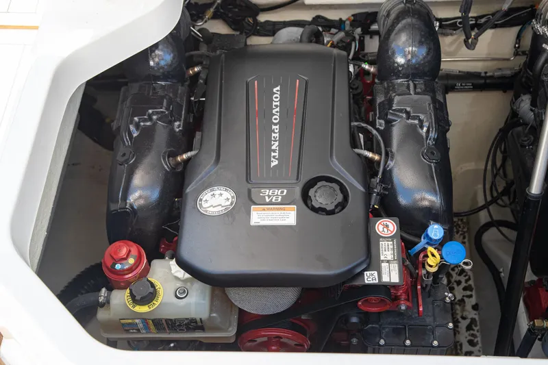 Slide: The Image of 2023 Cobalt R33 engine compartment featuring a Volvo Penta 380 V8 engine. - 52