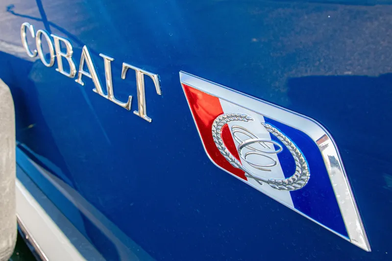 Slide: The Image of 2023 Cobalt R33 logo on blue vehicle exterior. - 60