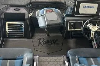 Slide: The Image of 2025 Ranger Z520R boat interior with advanced navigation system and comfortable seating. - 4