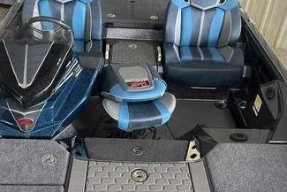 Slide: The Image of 2025 Ranger Z520R boat interior with blue and gray seating, modern design. - 6