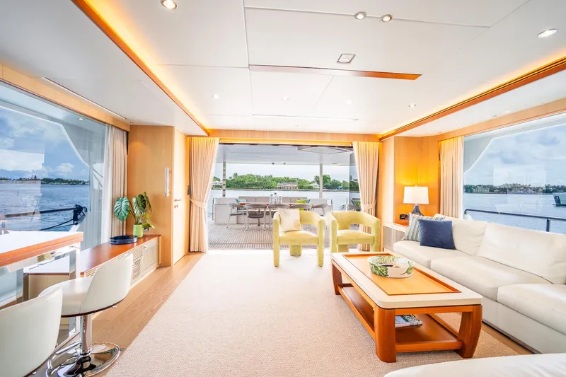 Slide: The Image of Luxurious interior of 2020 Horizon FD80 yacht with elegant furnishings and panoramic windows. - 106